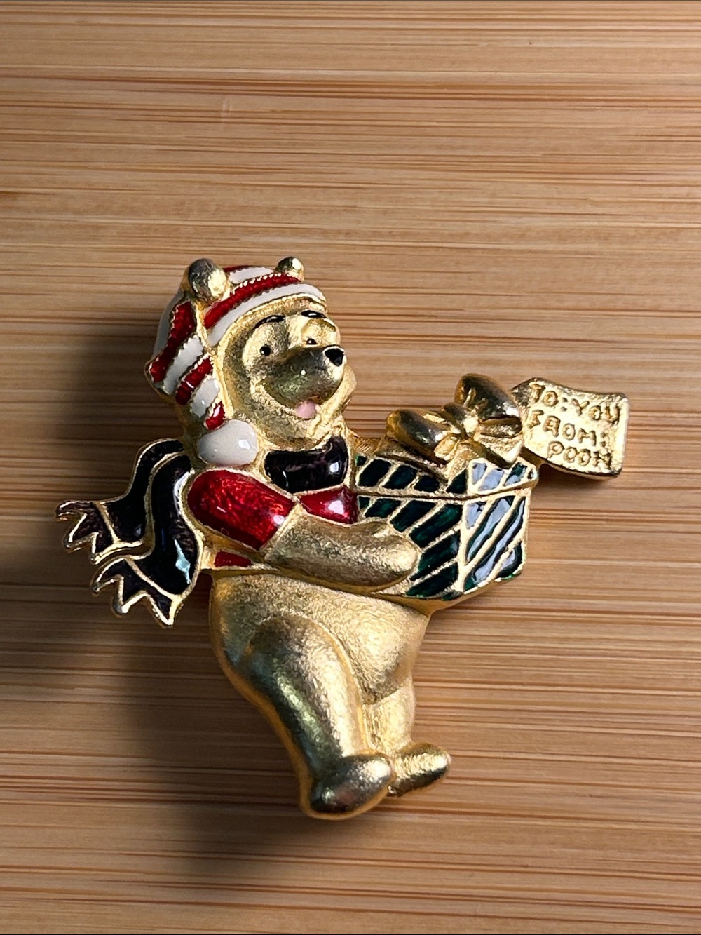 Gold Winnie-the-Pooh Holiday Enamel Pin with Red and Green Accents